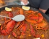 Paellera de arroz con bogavante en El Botánico de Ramón y Marisol